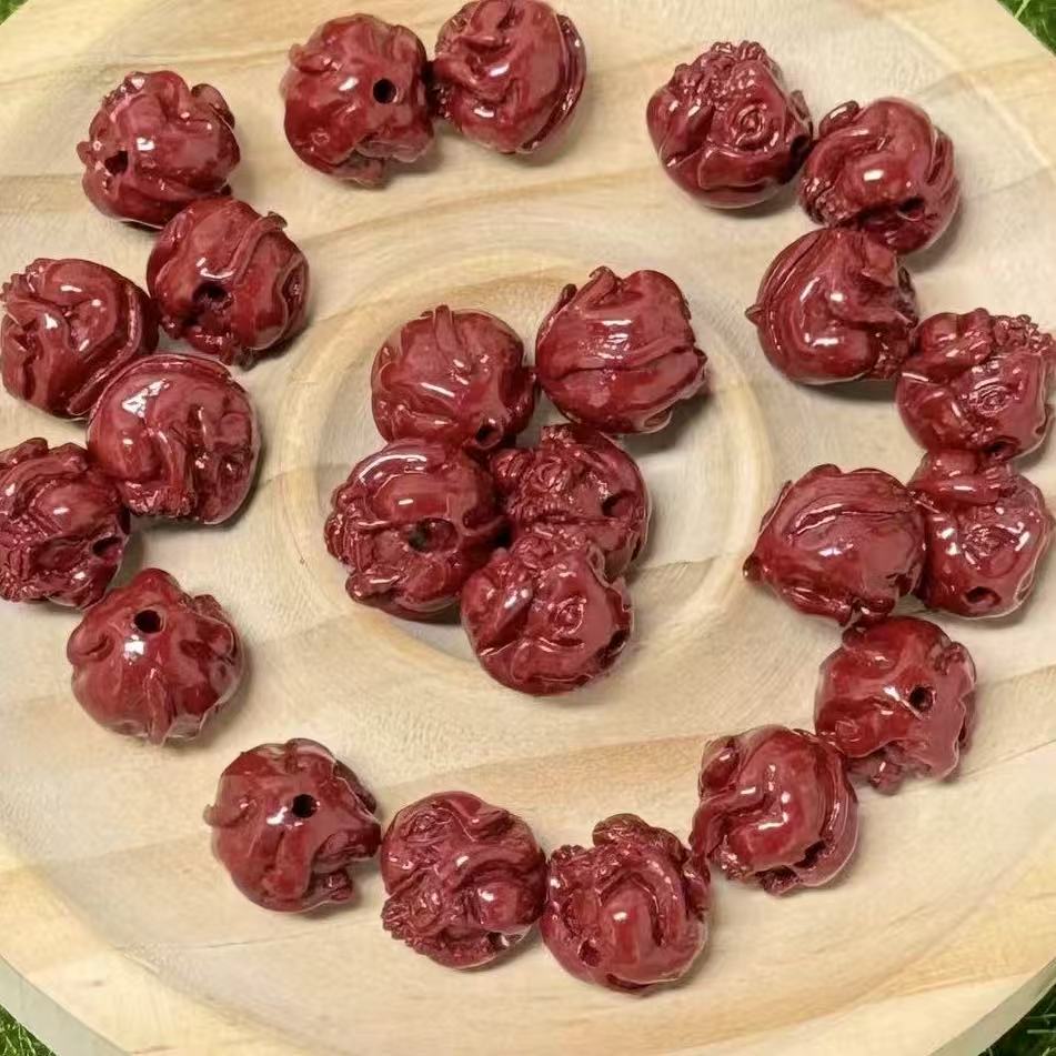 Cinnabar Carving charm-felicity